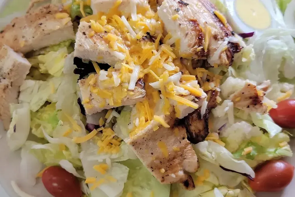 A chef salad with cheese and tomato at Harry’s Cafe, Katella Ave, Stanton, CA.
