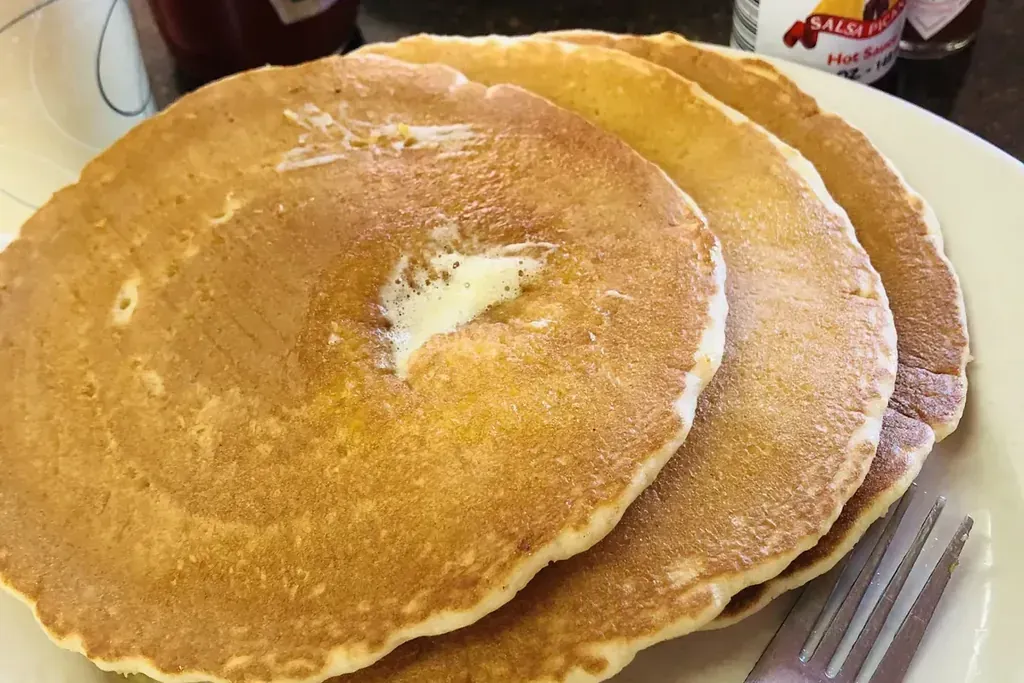 A stack of pancakes with butter at Harry’s Cafe, Katella Ave, Stanton, CA.
