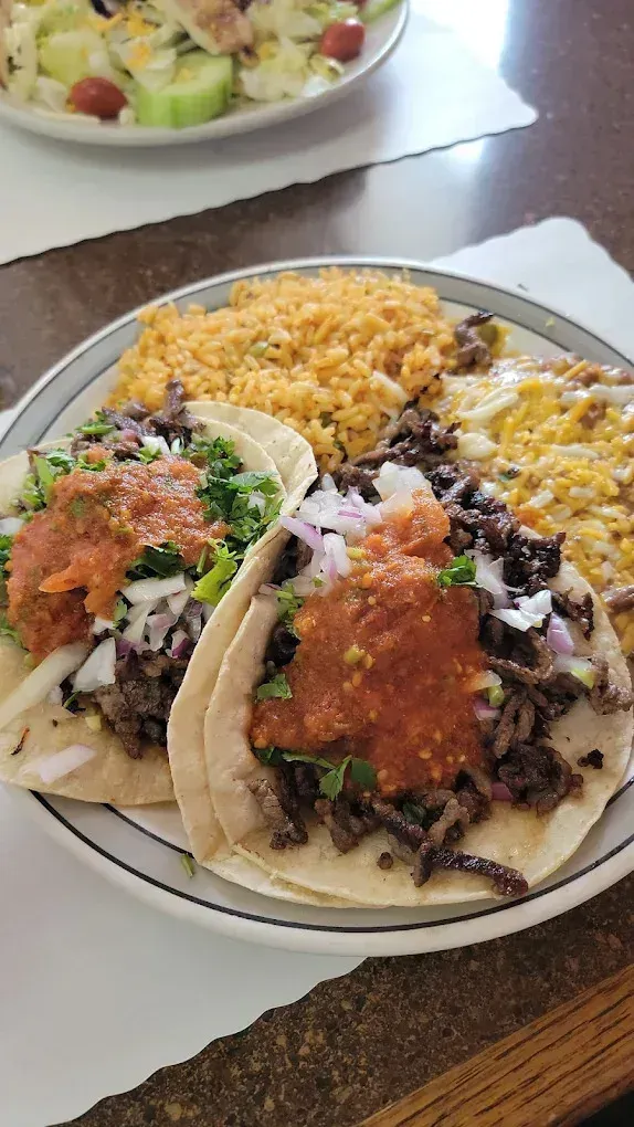 Two carne asada tacos with rice and corn at Harry's Cafe, Katella Ave, Stanton, CA