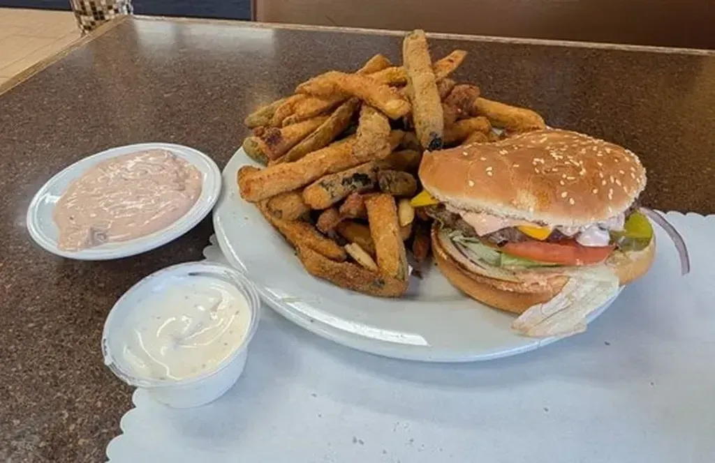 A cheeseburger with fried zucchini and dipping sauces at Harry's Cafe, Katella Ave, Stanton, CA