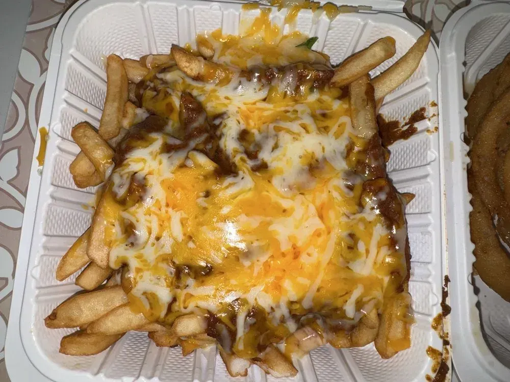 Chili cheese fries in a takeout box at Harry's Cafe, Katella Ave, Stanton, CA