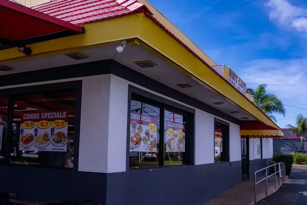 The front of the building with combo specials in the windows at Harry's Cafe, Katella Ave, Stanton, CA