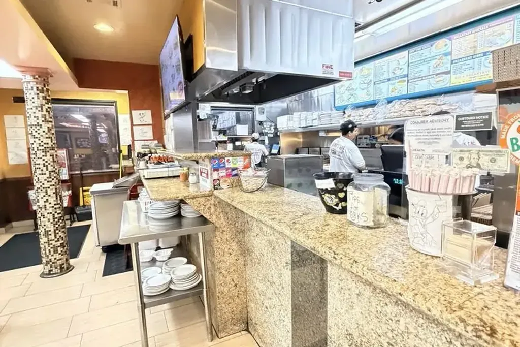 The counter and pay area beside the kitchen at Harry's Cafe, Katella Ave, Stanton, CA