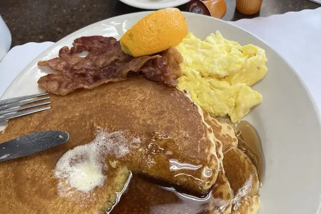 A pancake breakfast with bacon and eggs at Harry's Cafe, Katella Ave, Stanton, CA