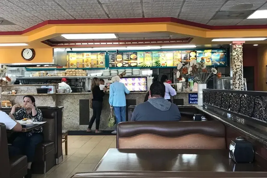 Booths along the dining room and the counter at Harry's Cafe, Katella Ave, Stanton, CA
